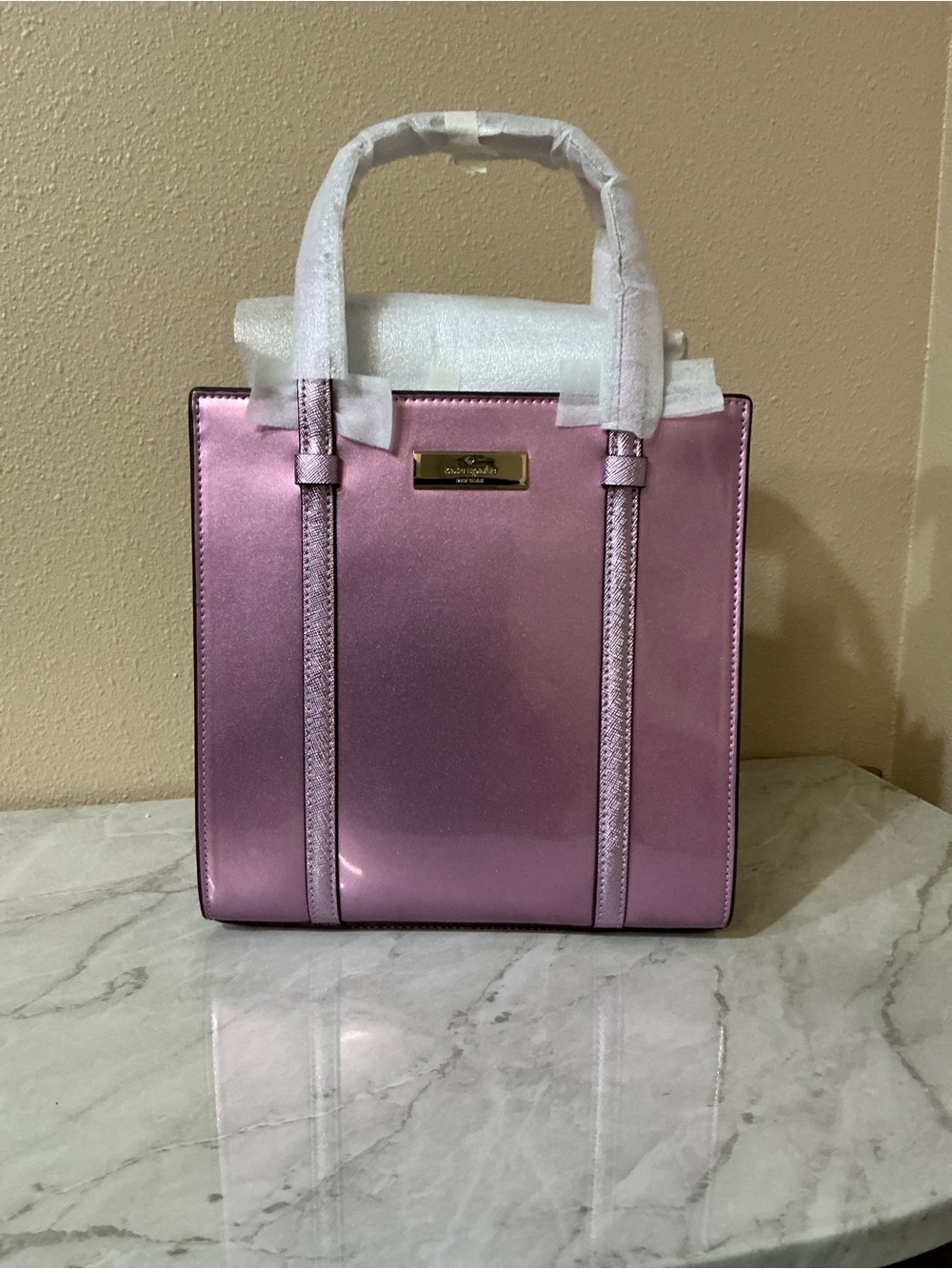 Kate Spade Mini Tote Metallic Quartz Pink.